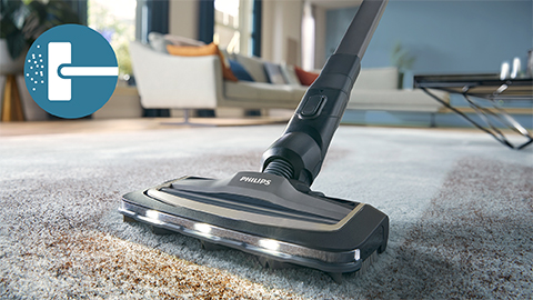 Bezprzewodowy odkurzacz Philips AquaTrio z funkcją mycia serii 9000 czyści dywany