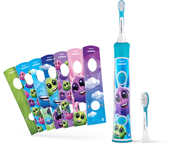Zestaw sprzedażowy szczoteczki sonicznej dla dzieci Sonicare For Kids - szoczteczak elektrzyczna dla dzieci, dwie gł&oacute;wki do mycia zęb&oacute;w dla młodszych i starszych dzieci, kolorowe naklejki umożliwiające poersonalizaję szczoteczki, darmowa aplikacja wspierająca naukę i szczotkowanie zęb&oacute;w.